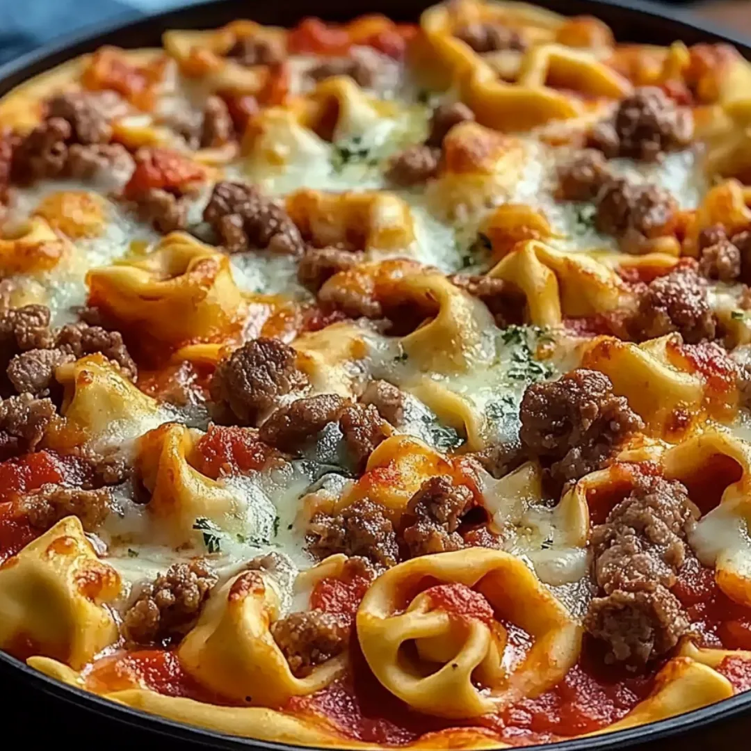 Saucy noodles and hearty meats topped with cheese.