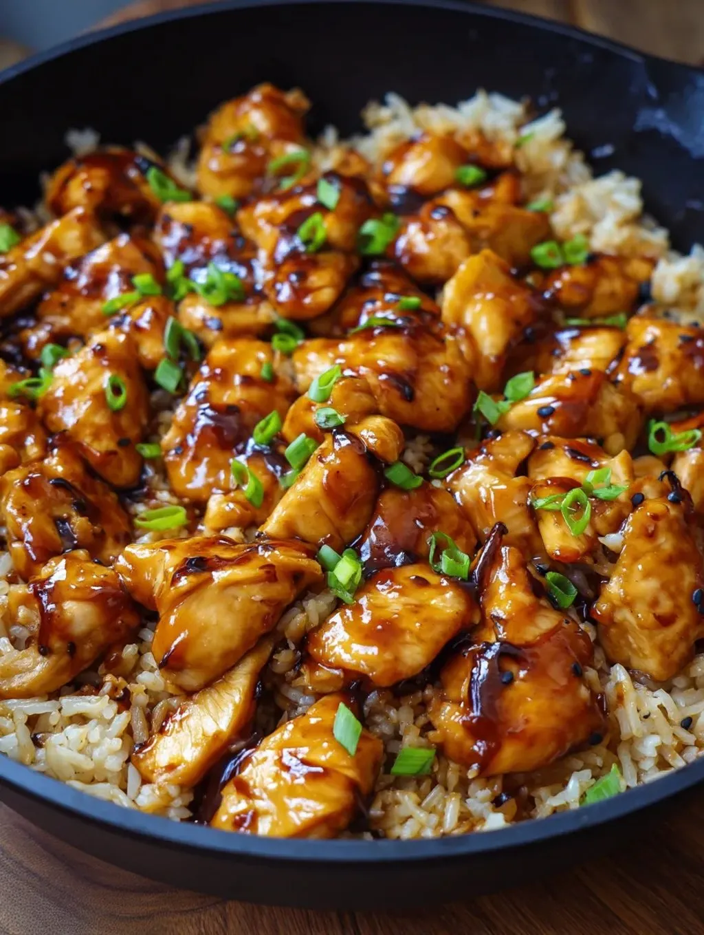 A plate of food with rice and meat.
