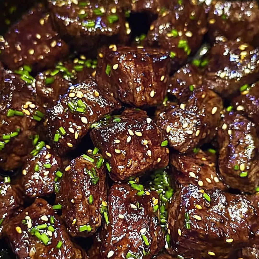 Juicy beef pieces sprinkled with herbs.