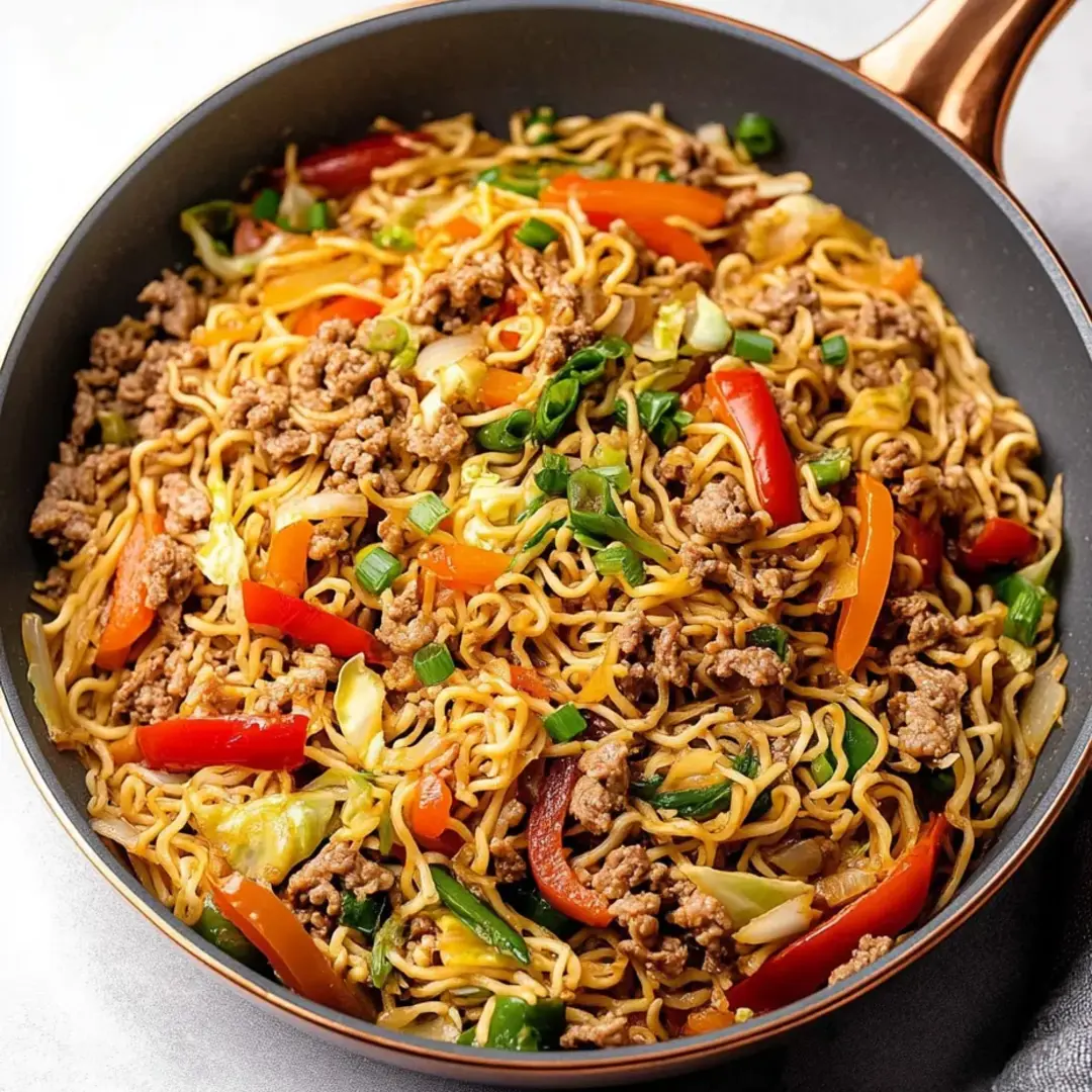 Noodle bowl packed with chicken, veggies, and loads of color.