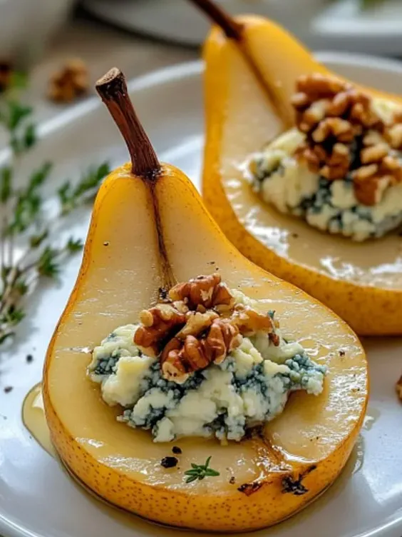 A chunk of pear topped with a single walnut.
