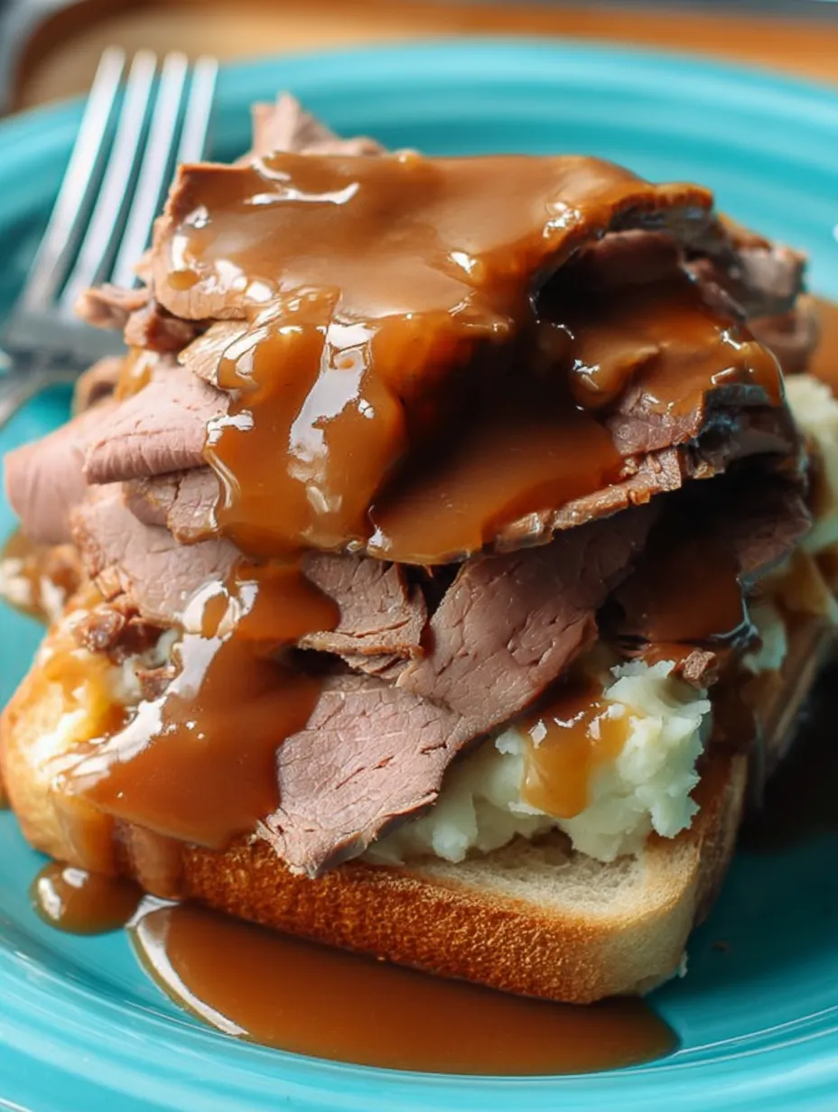 A plate of meat and gravy.