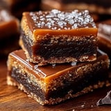 A chocolate dessert with a piece missing.