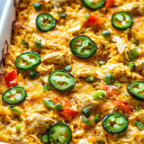 Chicken, peppers, and jalapeños in a dish.