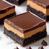 Chocolate treat loaded with caramel and peanut butter layers.