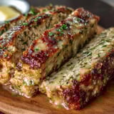 Meaty dish topped with melty cheese.